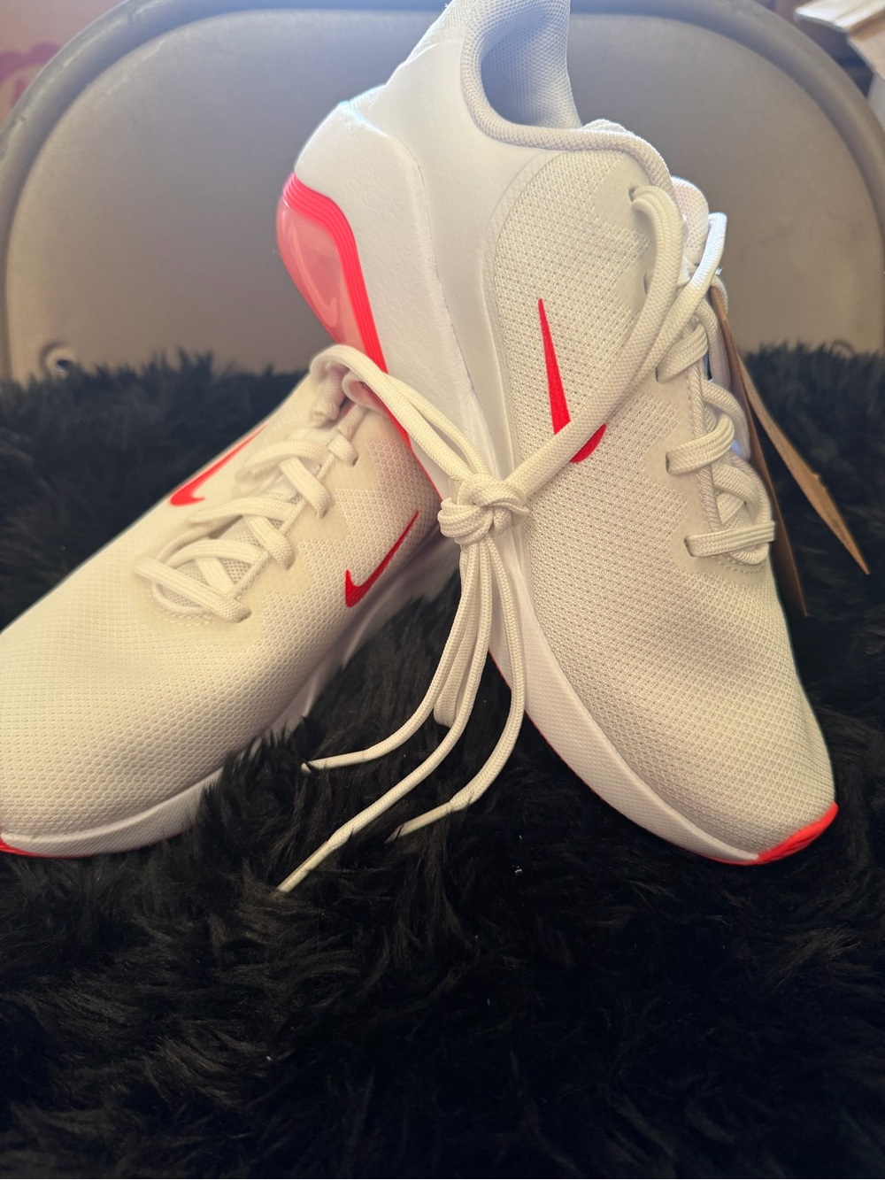 Nike Women’s White Athletic Sneakers with Neon Coral Accents